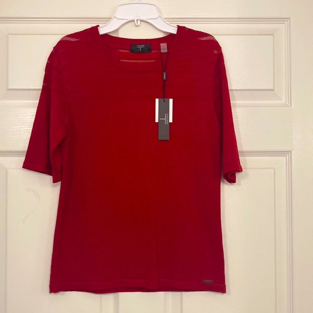 New with tags red short sleeve sweater.  Made of Rayon and Nylon.